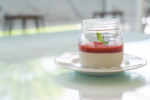 panna cotta with cherry and ginger sauce