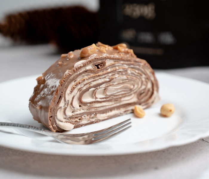chocolate roulade with cocoa and peanuts