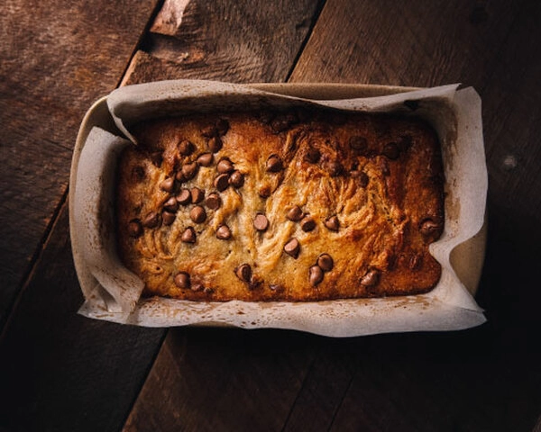 banana bread with chocolate and raspberries